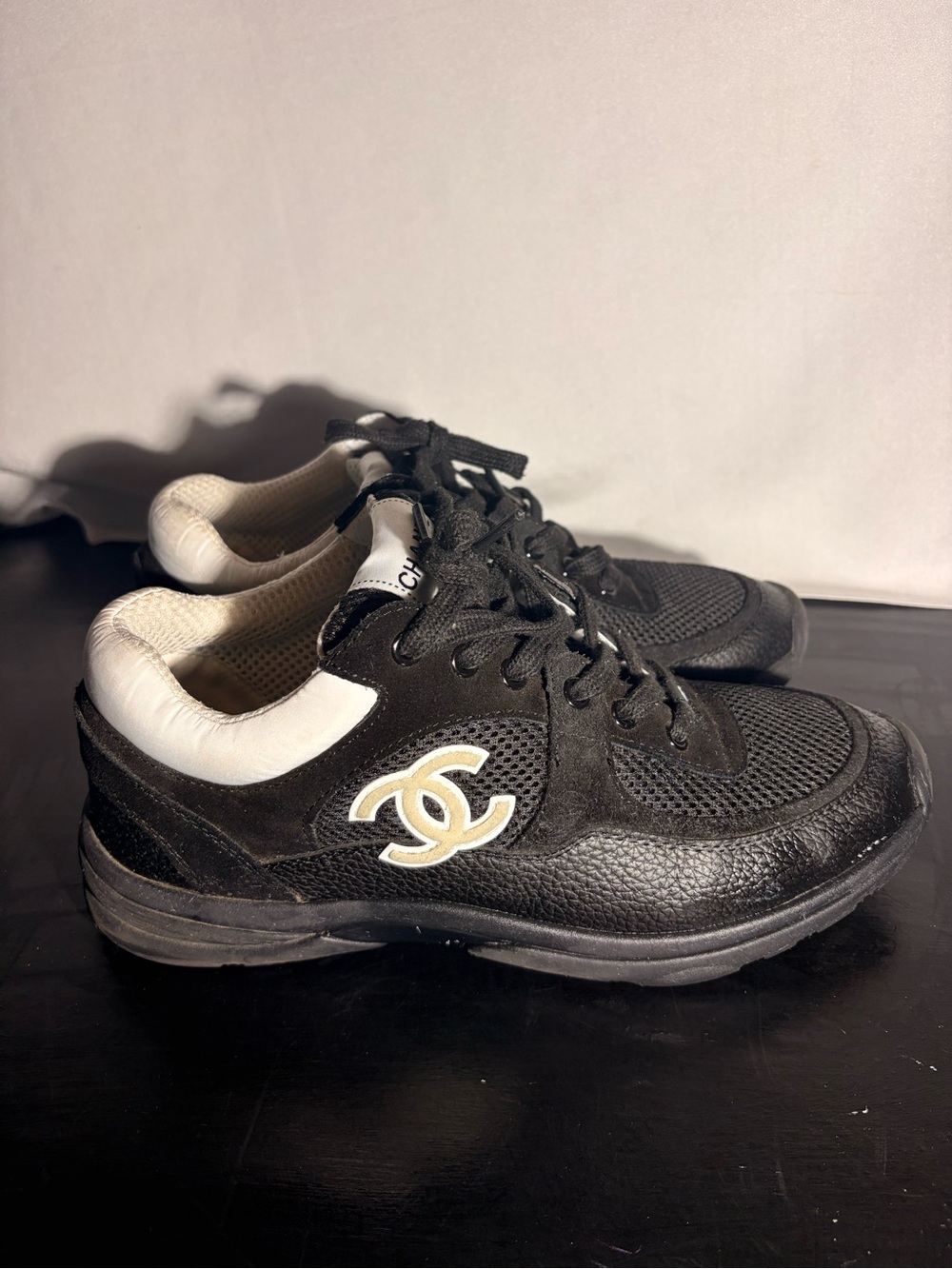 CHANEL Black Leather & Mesh Men's Sneakers with White Collar